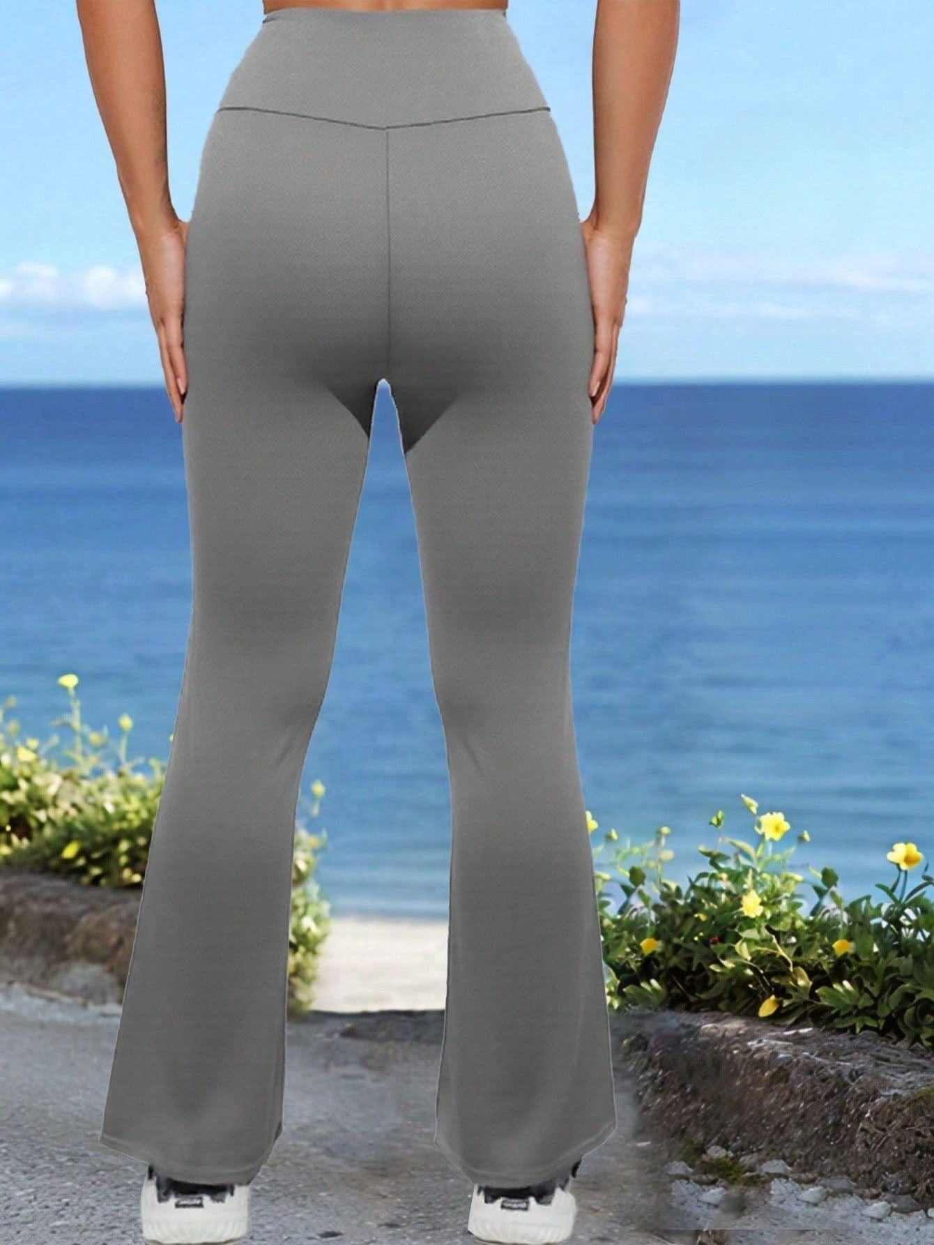 Calça Legging Flare Cintura Alta Com Bolsos Laterais