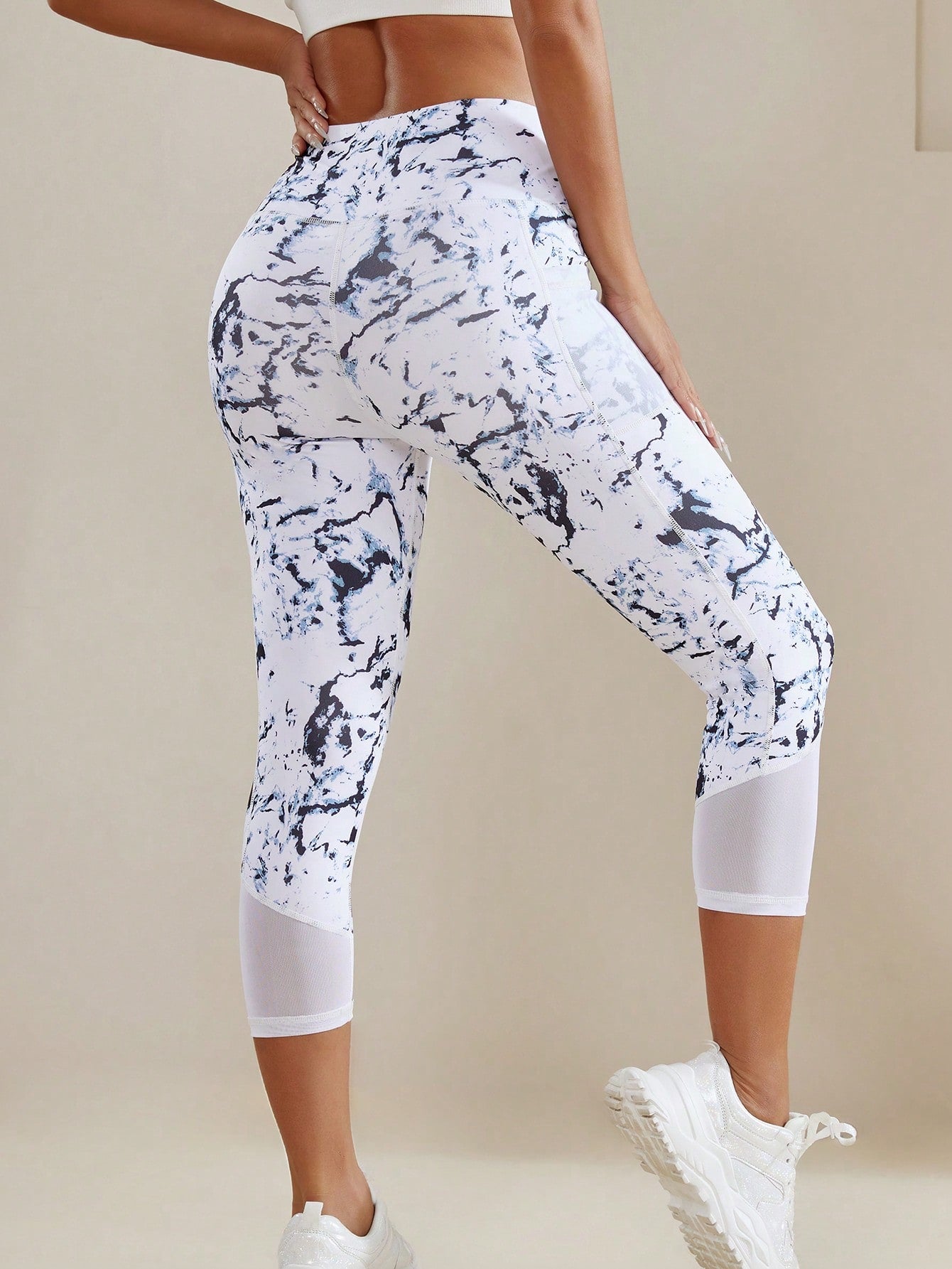 Calça Legging Capri Estampada com Bolso e Tela Respirável