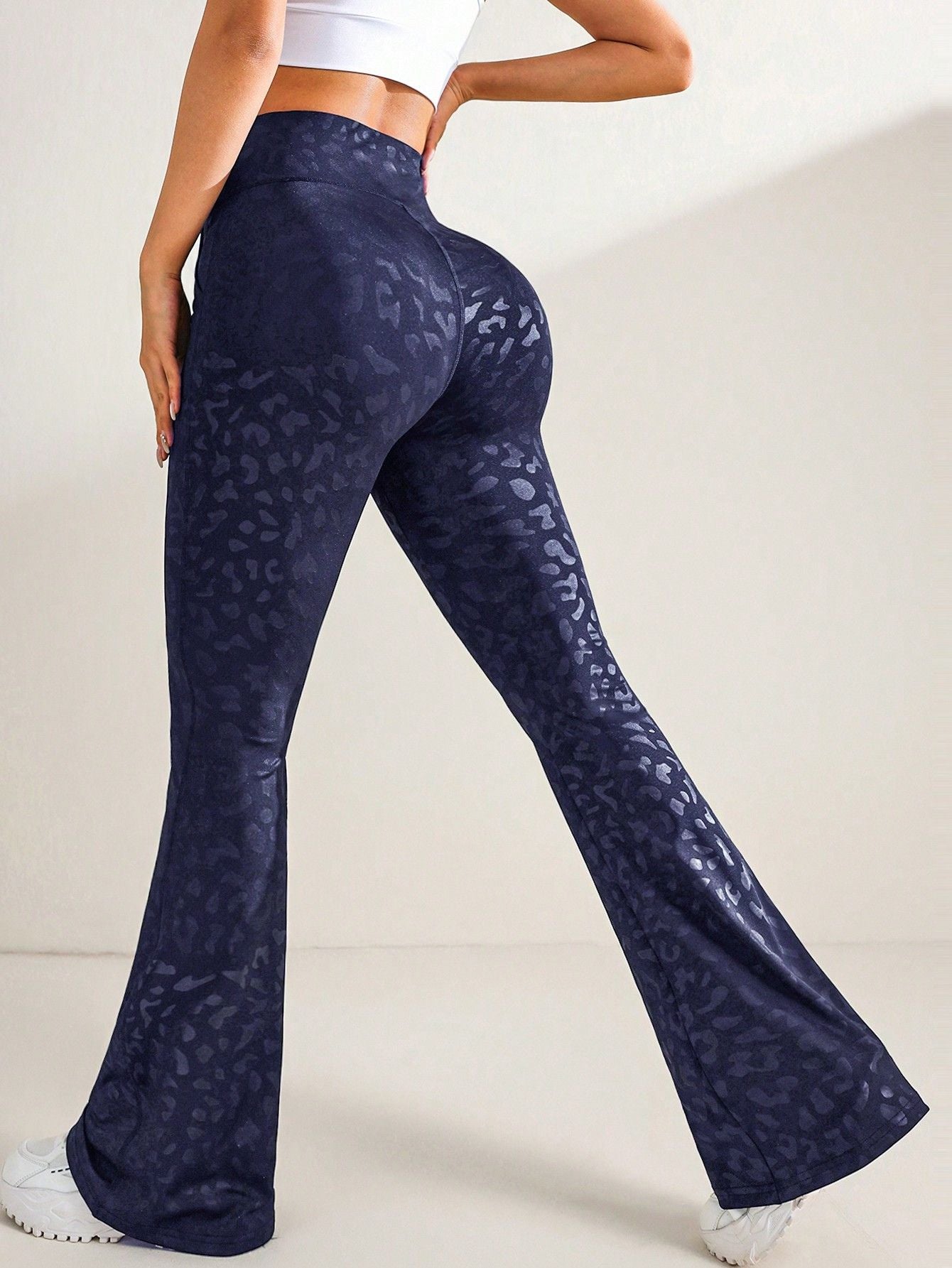 Calça Legging Flare Fitness Estampada Com Bolsos Laterais