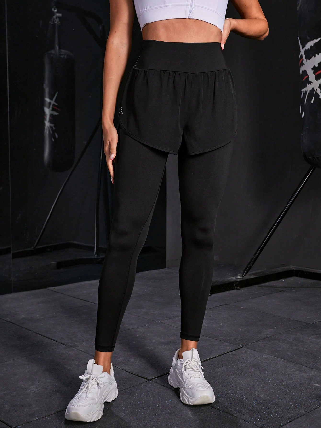 Calça Legging Fitness Com Saia Embutida E Bolso Lateral