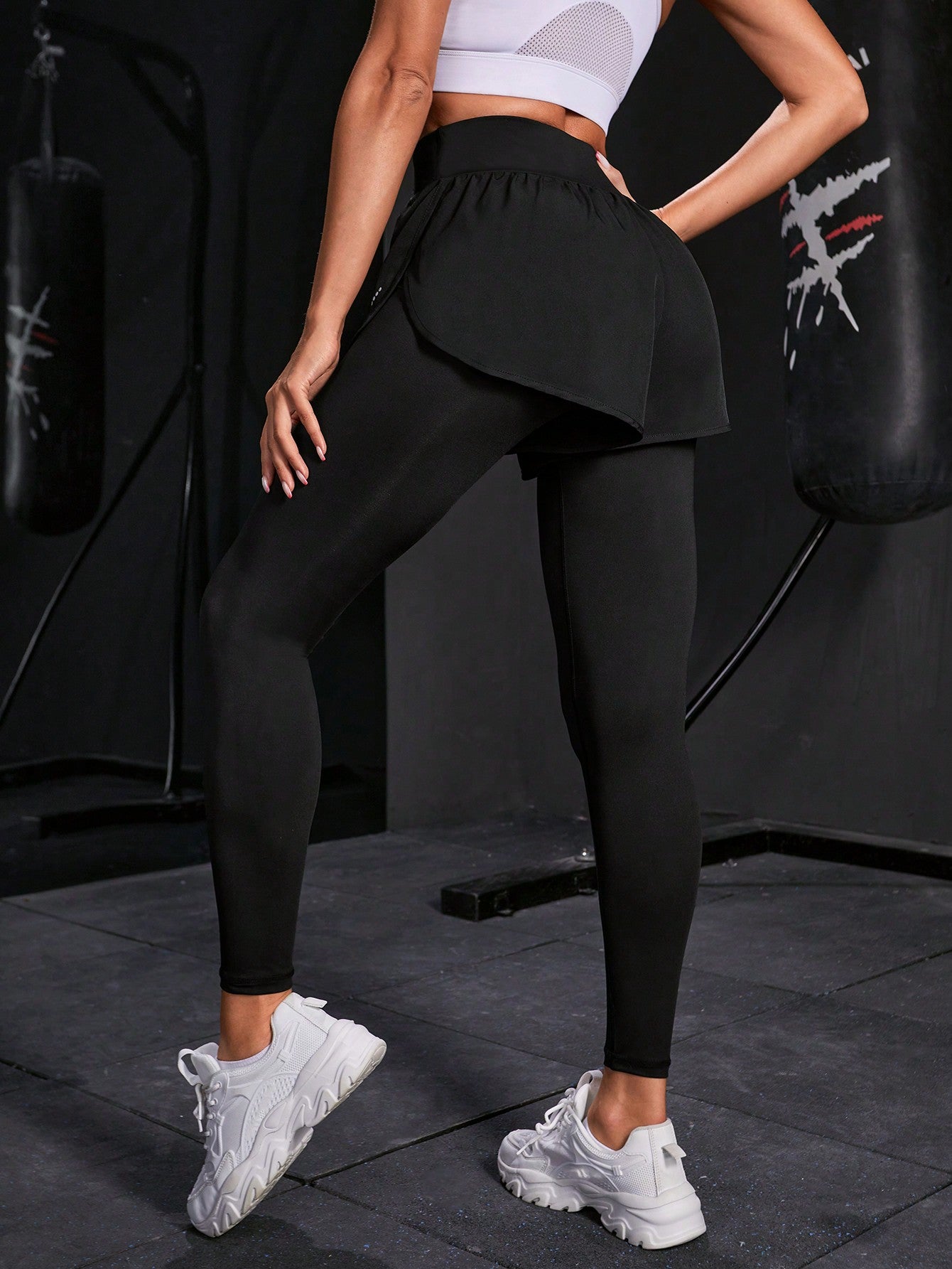Calça Legging Fitness Com Saia Embutida E Bolso Lateral
