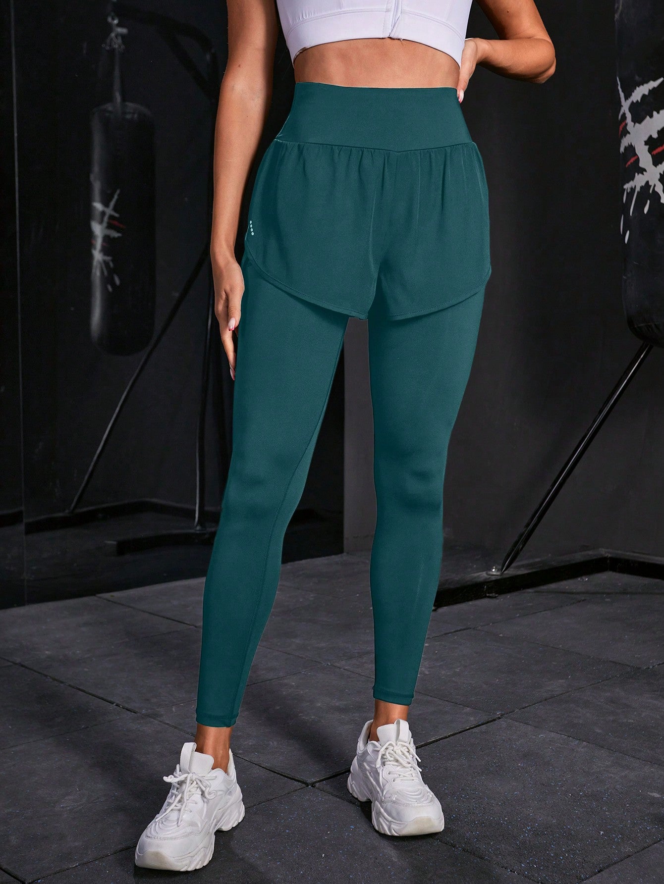 Calça Legging Fitness Com Saia Embutida E Bolso Lateral