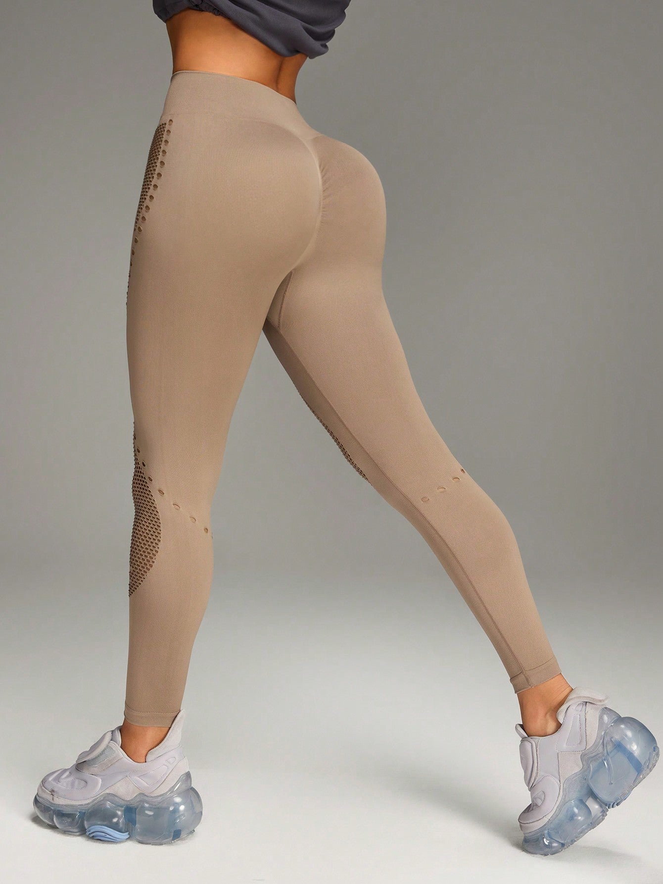 Calça Legging Fitness Sem Costura com Recortes Vazados