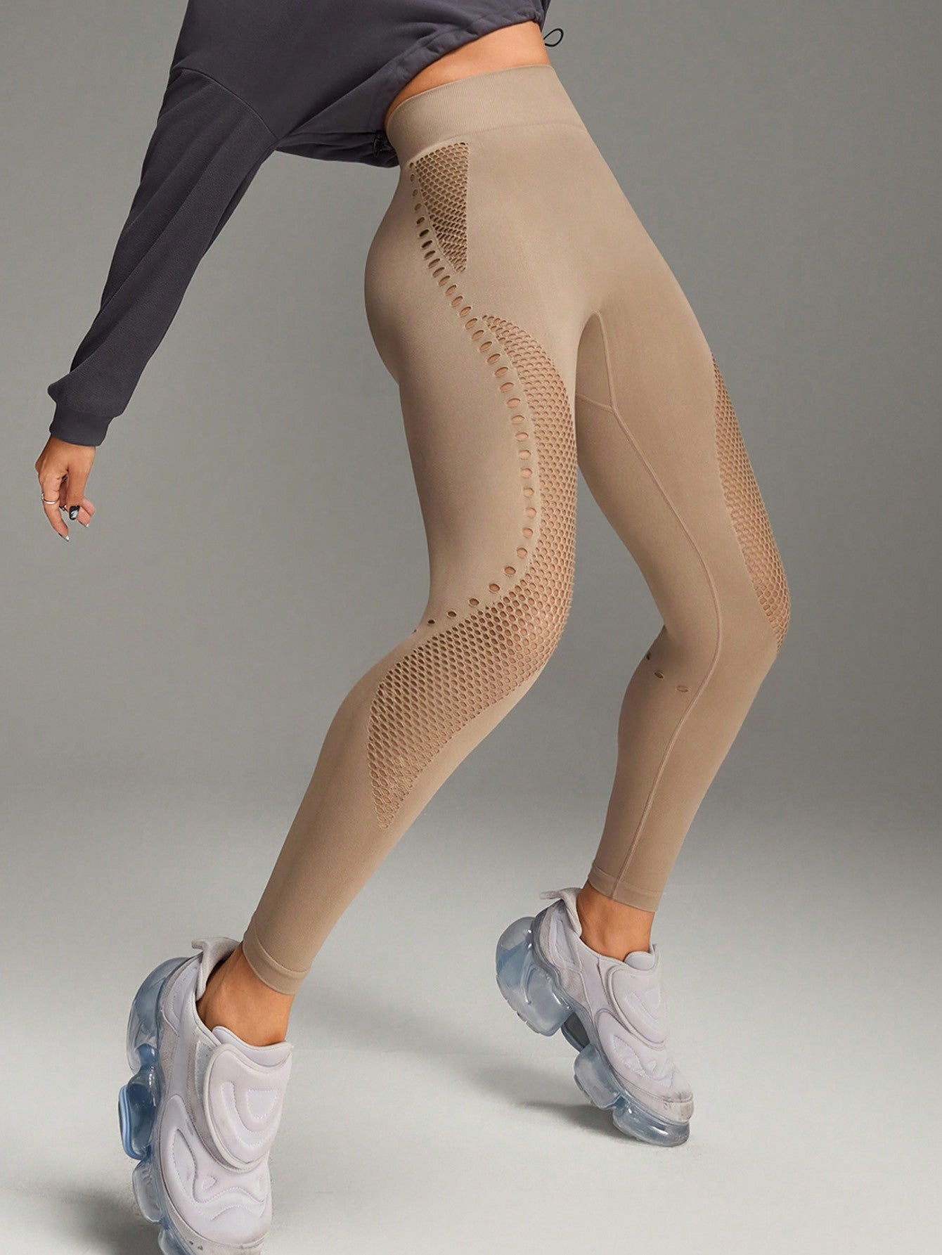 Calça Legging Fitness Sem Costura com Recortes Vazados