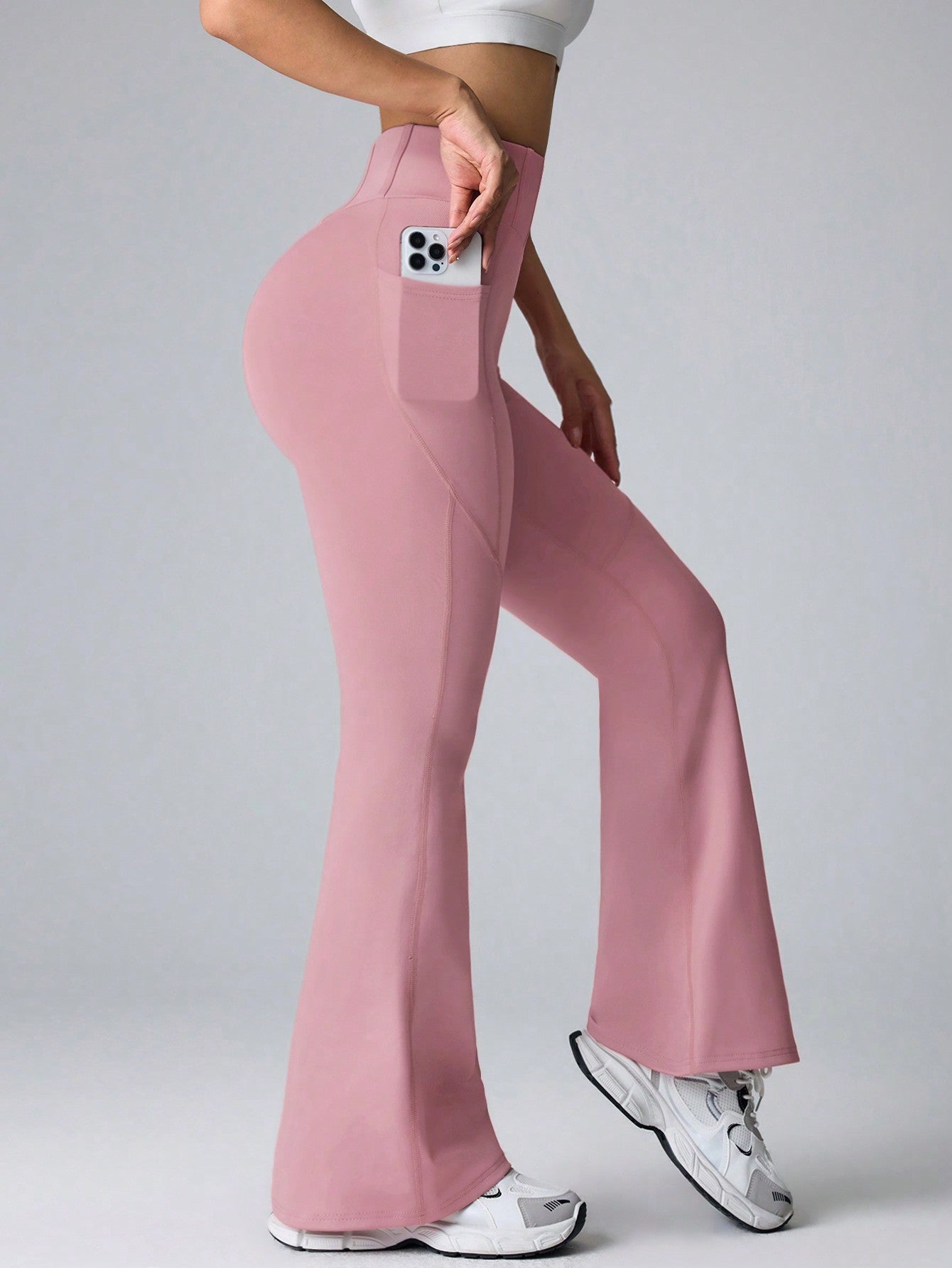 Calça Legging Flare Fitness Cintura Alta Com Bolsos Laterais