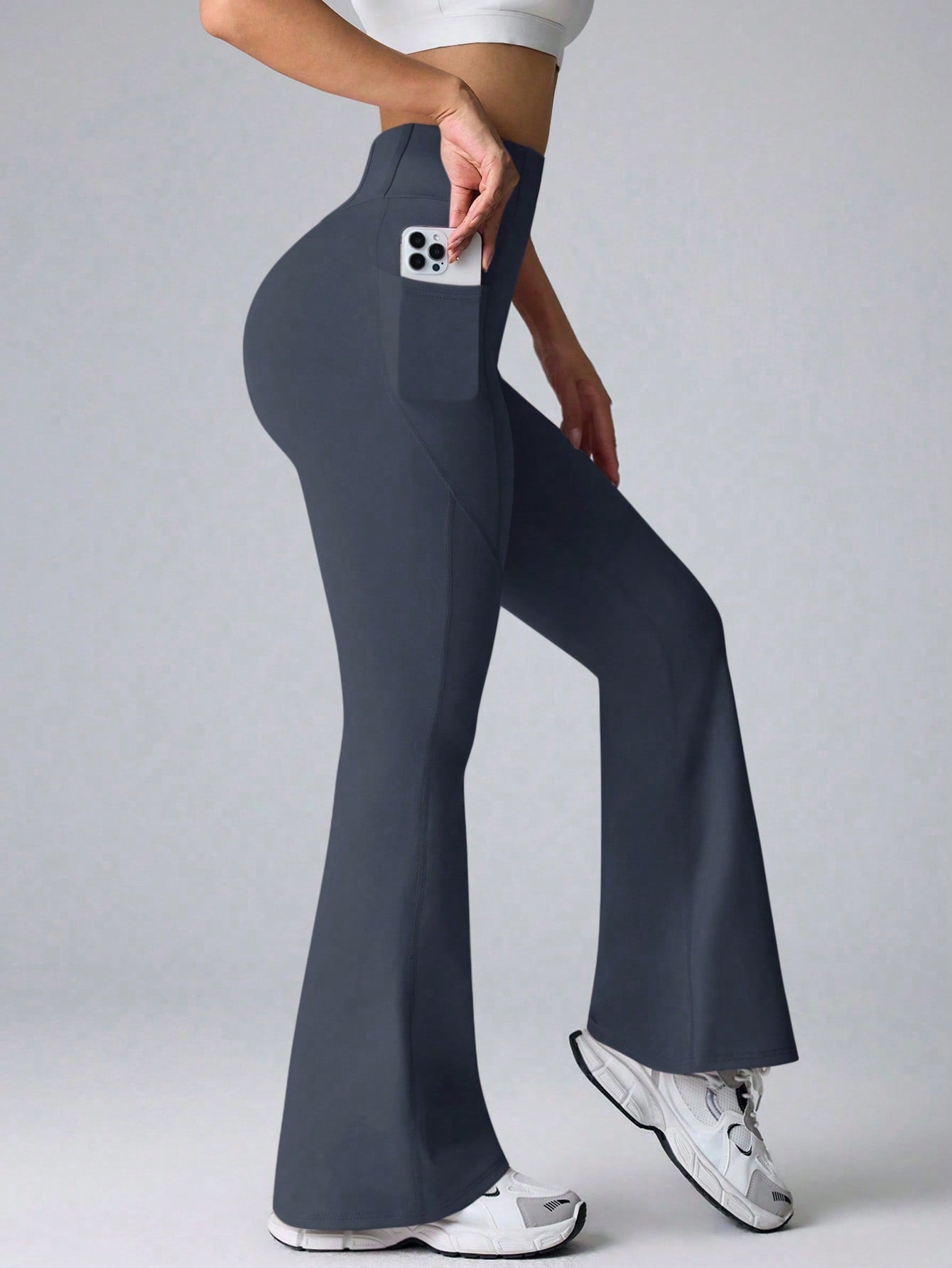 Calça Legging Flare Fitness Cintura Alta Com Bolsos Laterais