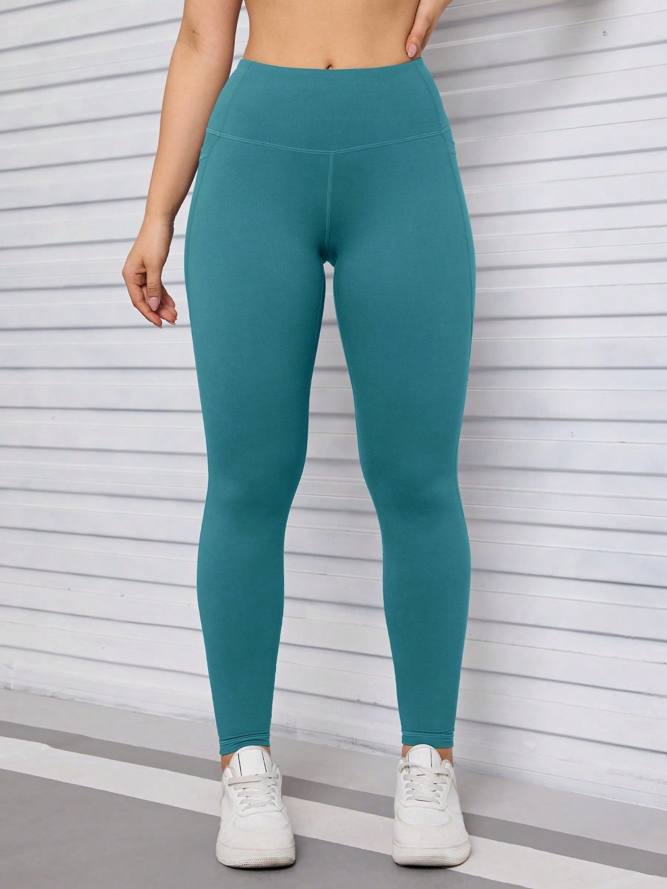 Calça Legging Feminina Cintura Alta com Bolsos Laterais
