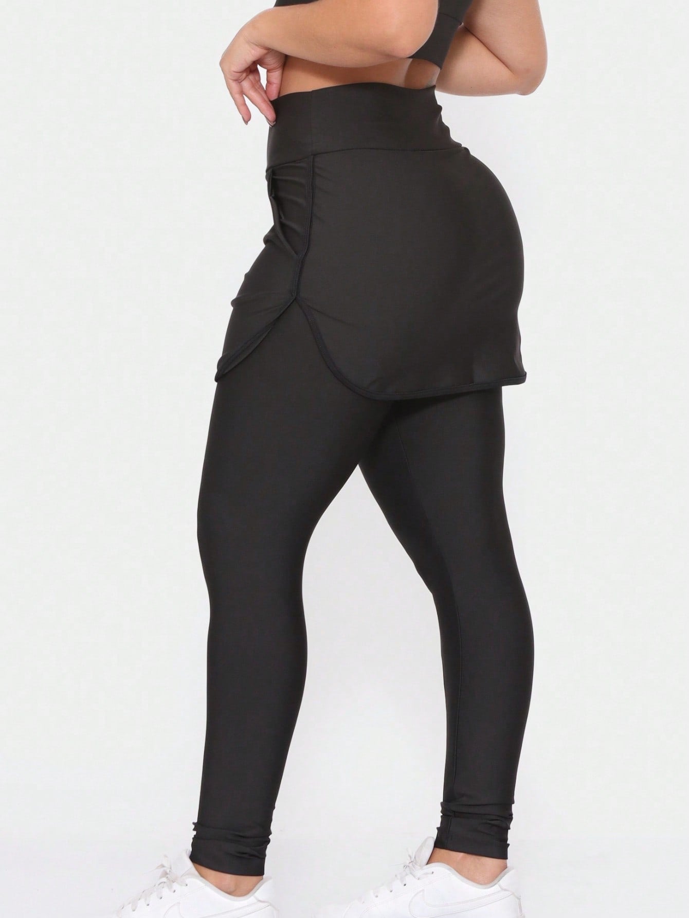 Calça Legging Feminina Com Saia Sobreposta E Bolsos
