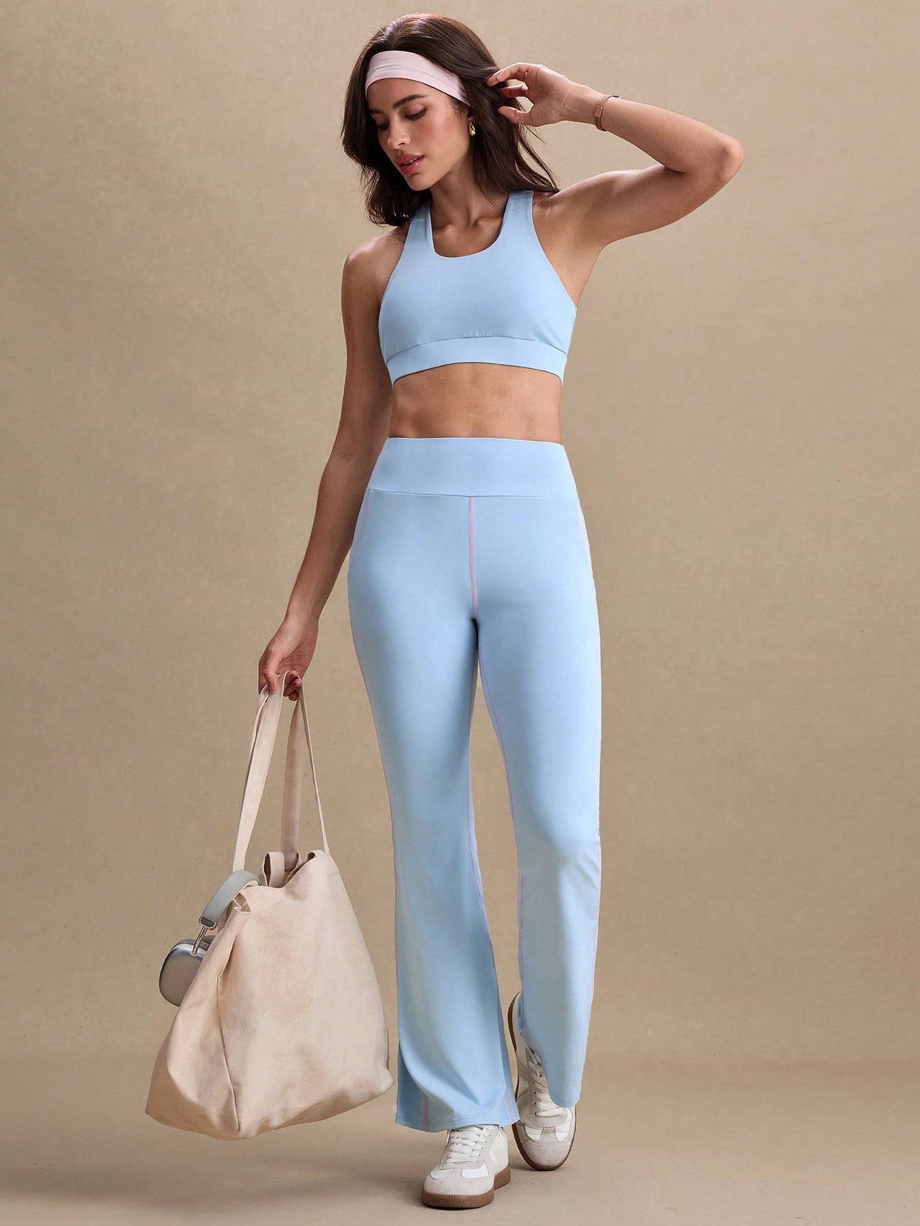 Calça Legging Flare Feminina com Cintura Alta e Bolsos