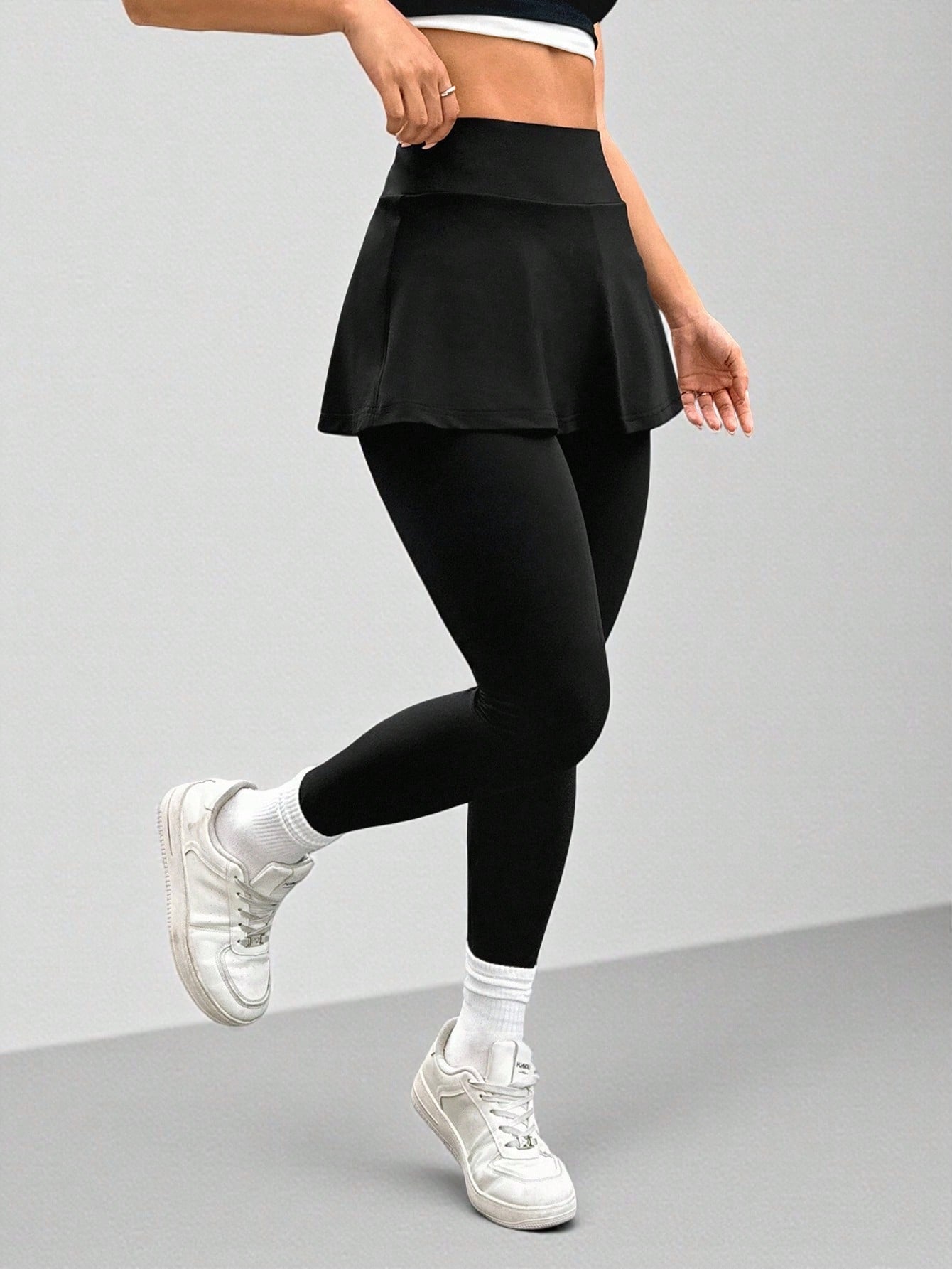Calça Legging Com Saia Embutida E Bolso Lateral
